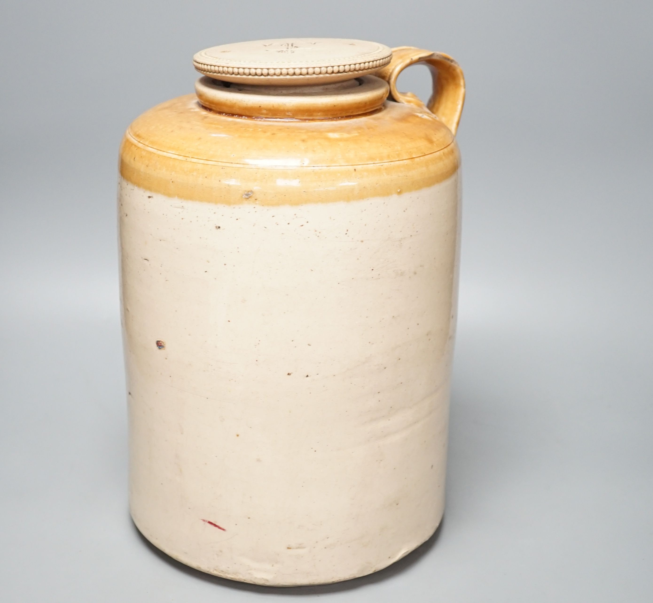 A Grosvenor Glasgow stoneware beer, storage jar, 37 cms high.